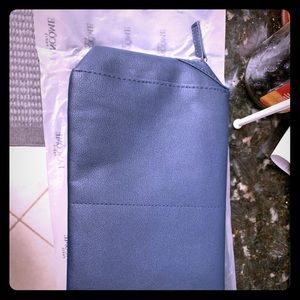 Matte blue Lancôme cosmetic bag